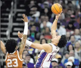  ?? Charlie Riedel The Associated Press ?? Forward Jalen Wilson and the defending champion Kansas Jayhawks are the No. 1 seed in a stacked West Region.