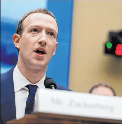  ?? Andrew Harnik The Associated Press ?? Facebook CEO Mark Zuckerberg testifies on Capitol Hill in Washington.