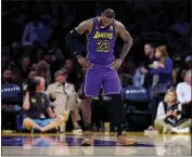  ?? SEAN M. HAFFEY — GETTY IMAGES ?? The Lakers' LeBron James, dealing daily with ankle issues, missed his 10th game of the season on Tuesday.
