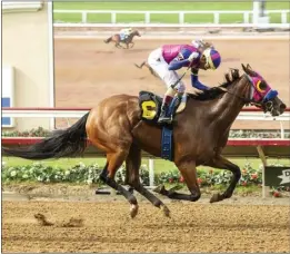  ?? BENOIT PHOTO VIA AP ?? Big Pond, ridden by jockey Ramon Vazquez, gets the victory in the $175,000Fleet Treat Stakes race for 3-year-old fillies on Thursday at Del Mar.