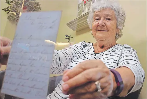  ?? BRAD WORKS/JOURNAL PIONEER ?? Kay Taylor displays the letter Joseph Howe wrote to her husband’s great grandfathe­r dated July 2, 1867.