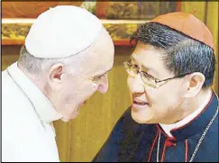 ?? AFP ?? In this October 2015 photo, Pope Francis speaks with then Manila Archbishop Luis Antonio Cardinal Tagle at the Vatican.