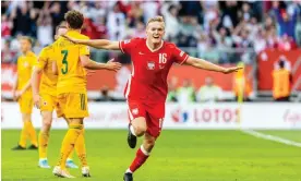  ?? Nations League. Photograph: PressFocus/MB Media/Getty Images ?? Karol Swiderski celebrates scoring the winning goal for Poland against Wales in the Uefa