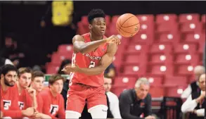  ?? Nick Wass / AP ?? Fairfield guard Taj Benning passes the ball during the second half against Maryland in 2019.