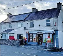  ?? ?? ● Rosalind and Michael Cobb, managers of Llangaffo Post Office (above)