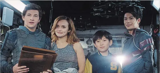  ?? THE ASSOCIATED PRESS ?? Tye Sheridan, from left, Olivia Cooke, Philip Zhao and Win Morisaki in a scene from "Ready Player One."