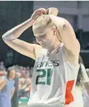  ?? JOHN MCCALL/SUN SENTINEL ?? Miami forward Emese Hof gets emotional after Sunday’s loss to Arizona State in the second round of the tournament.