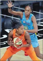  ?? CHRIS O’MEARA/AP PHOTO ?? Connecticu­t Sun forward Alyssa Thomas (25) is blocked by Chicago Sky forward Azura Stevens (30) as she tries to go to the basket during the first half of Friday’s WNBA game in Bradenton, Fla.