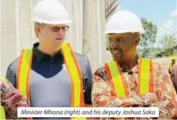  ?? ?? Minister Mhona (right) and his deputy Joshua Sako