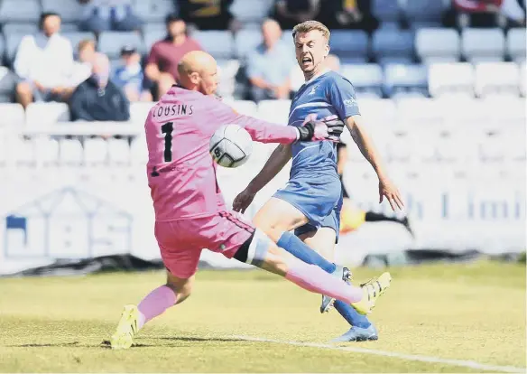  ??  ?? Hartlepool United’s Rhys Oates gets the better of Bromley goalkeeper Cousins.