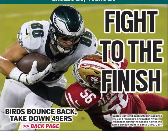  ?? TONY AVELAR — THE ASSOCIATED PRESS ?? Eagles tight end Zach Ertz runs against
San Francisco’s linebacker Kwon Alexander during the second half of the game Sunday night in Santa Clara, Calif.