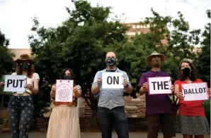  ?? Photos by Hyoung Chang, The Denver Post ?? From left, SarahDawn Haynes, Chelsea Castellano, Eric Budd, Kurt Nordback and his wife Krista represent Bedrooms Are For People. The campaign seeks to amend Boulder’s city charter over the number of unrelated people allowed to share a home.