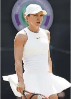  ??  ?? Top-seeded Simona Halep was ousted from Wimbledon by Su-Wei Hsieh of Taiwan in their third-round match Saturday.