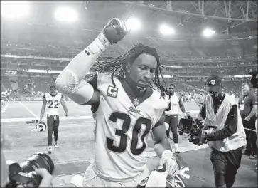  ?? Ross D. Franklin Associated Press ?? RAMS running back Todd Gurley, shown in Glendale, Ariz., in December, won’t have to deal with sack artist Khalil Mack, who was traded to the Chicago Bears on Saturday from the Oakland Raiders, until Week 14.