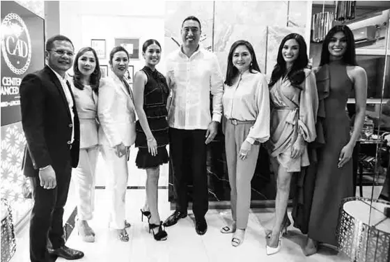  ?? —PHOTOS: JAM STA. ROSA ?? During the ribbon-cutting ceremony of the CAD Greenhills clinic: (from left) Dr. Carlito H. Librando, Dr. Mia Rosette V. Angeles, Dr. Maria Nelda V. Eufemio, Gabbi Garcia, San Juan City Mayor Francis Zamora, Charo Santos Concio, Miss Universe 2015 Pia Wurtzbach, Binibining Pilipinas Internatio­nal 2019 Patch Magtanong