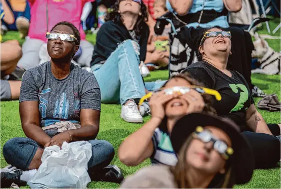  ?? Carlos Javier Sanchez/contributo­r ?? As it was during the annular eclipse in October, the only safe way to look at the sun during the total eclipse April 8 is through eclipse glasses that comply with the ISO 12312-2 internatio­nal safety standard.