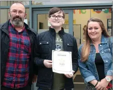  ??  ?? Mark Connor and Karen Sills with their son Josh Connor who was the first student to graduate from the autism unit.