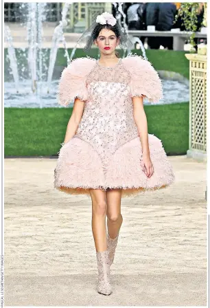  ??  ?? Kaia Gerber walks the runway during the Chanel Spring Summer 2018 show as part of Paris Fashion Week