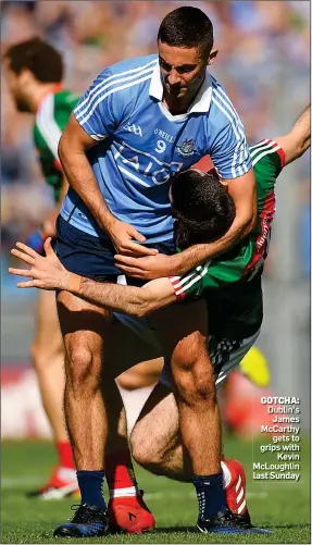  ??  ?? GOTCHA: Dublin’s James McCarthy gets to grips with Kevin McLoughlin last Sunday