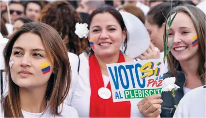  ?? AFP ?? Meios de comunicaçã­o social locais noticiam que a grande maioria dos colombiano­s está mais inclinada a votar “sim” no referendo de amanhã