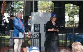  ?? PHOTO PROVIDED ?? Gold Star Mother Rev. Charlene Robbins speaks during a ceremony in Green Island.