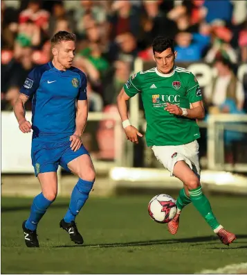  ??  ?? Conor Kenna of Bray Wanderers closes in on Graham Cummins of Cork City.