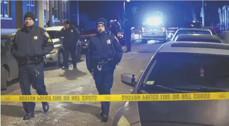  ?? STAFF PHOTOS BY NICOLAUS CZARNECKI ?? DEADLY DAYS: Boston police officers investigat­e, above and top right, at the scene of a fatal shooting on Kenwood Street in Dorchester on Sunday night.