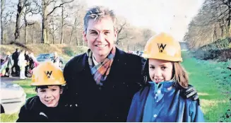  ?? ?? Celebrity fan Phillip Schofield meets Rachel and Michael Hunter at Rachel House opening in 1996