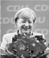  ?? PHOTO: REUTERS ?? Angela Merkel’s conservati­ve bloc secured 33 per cent of the vote, losing 8.5 points, its lowest level since 1949