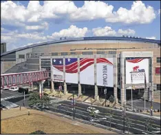  ?? GENE J. PUSKAR / ASSOCIATED PRESS ?? The Quicken Loans Arena in downtown Cleveland is covered in signage on Wednesday in preparatio­n for the upcoming Republican National Convention.