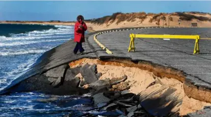  ?? JOHN TLUMACKI/GLOBE STAFF/FILE 2012 ?? Erosion collapses a parking lot at Herring Cove Beach in Provinceto­wn.