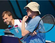  ?? Foto: Profimedia.cz ?? Učitel a žák Andre Agassi (vpravo) věří, že jeho svěřenec Dimitrov může vyhrát grandslam.
