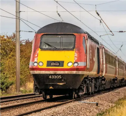  ?? MIKE BROOK. ?? LNER 43305 approaches Causeway Lane Level Crossing (Lincolnshi­re) on October 22, heading the 1202 York-London King’s Cross. 43319 was on the rear. LNER has begun withdrawin­g HSTs from service, with some set for scrap in the coming weeks.