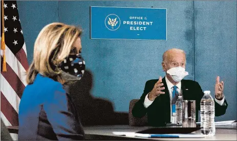  ?? ANNA MONEYMAKER/THE NEW YORK TIMES ?? President-elect Joe Biden meets with House Speaker Nancy Pelosi on Friday at The Queen theater in Wilmington, Delaware.