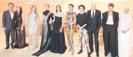  ?? — AFP photo ?? Anya Taylor-Joy (right) poses with (from left) Josh Brolin, Florence Pugh, Lea Seydoux, Rebecca Ferguson, Souheila Yacoub, Zendaya, Timothee Chalamet, Stellan Skarsgard and Austin Butler on the red carpet upon arrival for the World premiere of ‘Dune: Part Two’ in Leicester Square, central London.