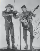  ??  ?? Les Paul (right) as Rhubarb Red, with Sunny Joe Wolverine, mid-1930s