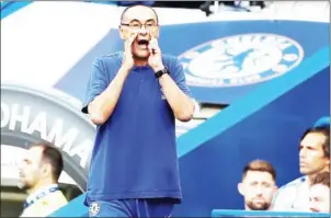  ?? AFP ?? Chelsea head coach Maurizio Sarri gestures on the touchline during their English Premier League match with Arsenal at Stamford Bridge in London on August 18.