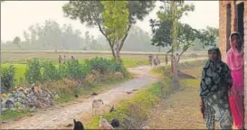  ?? SUBHANKAR CHAKRABORT­Y/ HT PHOTO ?? ▪ People are on guard in Badrikhera village of Khairabad, Sitapur, after several dog attacks were reported in the area.