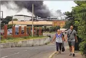  ?? Nina Lyashonok Associated Press ?? SMOKE RISES after shelling July 16 in Odesa, Ukraine. Russian missiles struck again Saturday.