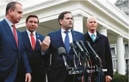  ?? JACQUELYN MARTIN/AP ?? Rep. Mario Diaz-Balart, R-Fla., left, Florida Gov. Ron DeSantis, Sen. Marco Rubio, R-Fla., and Sen. Rick Scott, R-Fla., speak to the media in 2019.