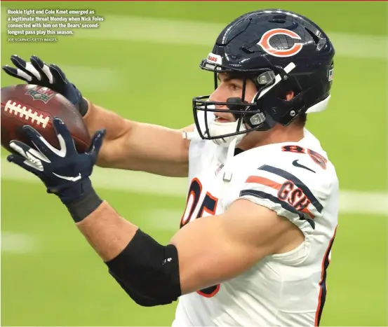  ?? JOE SCARNICI/GETTY IMAGES ?? Rookie tight end Cole Kmet emerged as a legitimate threat Monday when Nick Foles connected with him on the Bears’ secondlong­est pass play this season.