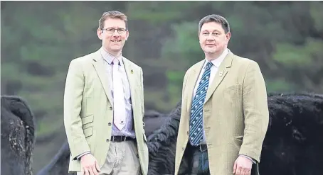  ?? Picture: Catherine Macgregor. ?? Former Aberdeen Angus Cattle Society chief executive Johnny Mackey, left, and president Alex Sanger.