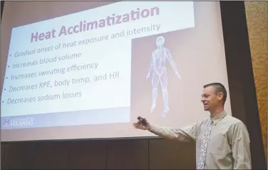  ?? NWA Democrat-Gazette/BEN GOFF • @NWABENGOFF ?? Dr. Brendon McDermott, University of Arkansas assistant professor of kinesiolog­y, gives a talk on preventing, recognizin­g and treating heat illness Thursday during the Mercy Coaching Summit at the John. Q. Hammons Center in Rogers.