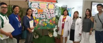  ?? ERWIN NICAVERA ?? SEARCH for Best Statistica­l Bulletin Board secretaria­t Efren Bantad (right) and April Glo Naria (2nd from right) with Cadiz District Hospital chief of hospital Dr. Ma. Girlie Pinongan (center), clinics chief Dr. Josephine Pahamtang (3rd from right) and judges during the evaluation at the said hospital in Cadiz City on Tuesday.