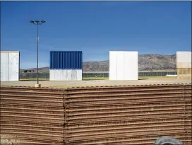  ?? KENT NISHIMURA / LOS ANGELES TIMES ?? The eight wall prototypes — four made of concrete and four from other, unspecifie­d material — were installed in California. They are going to have a Texas impact. The Lone Star State has 1,250 miles of the nearly 2,000-mile border. There is one Texas...