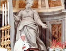  ?? — AFP ?? Pope Francis delivers his message as he leads the holy mass to mark the World Day of Peace, in St Peter’s Basilica at the Vatican on Monday.