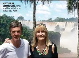  ??  ?? NATURAL WONDER: John and his wife Lynn at Iguazu Falls