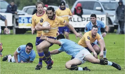  ?? PHOTO: PAUL RICKARD/GISBORNE HERALD ?? Running riot . . . North Otago’s Taina Tamou runs with the ball against East Coast at Ruatoria on Saturday.