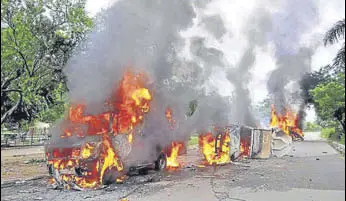  ?? HT FILE PHOTO ?? 74 vehicles, including two fire brigades, three OB vans of news channels and one school bus, were burnt and 57 vehicles, including one ambulance, were damaged.