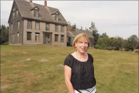  ?? Portland Press Herald via Getty Images ?? Christina Baker Kline stands outside the Olson House in Cushing, Maine, in 2017 after her fictionali­zed account of Christina Olson, the model for Andrew Wyeth’s most famous painting, was published. Her monumental novel, “The Exiles,” will be released Tuesday.